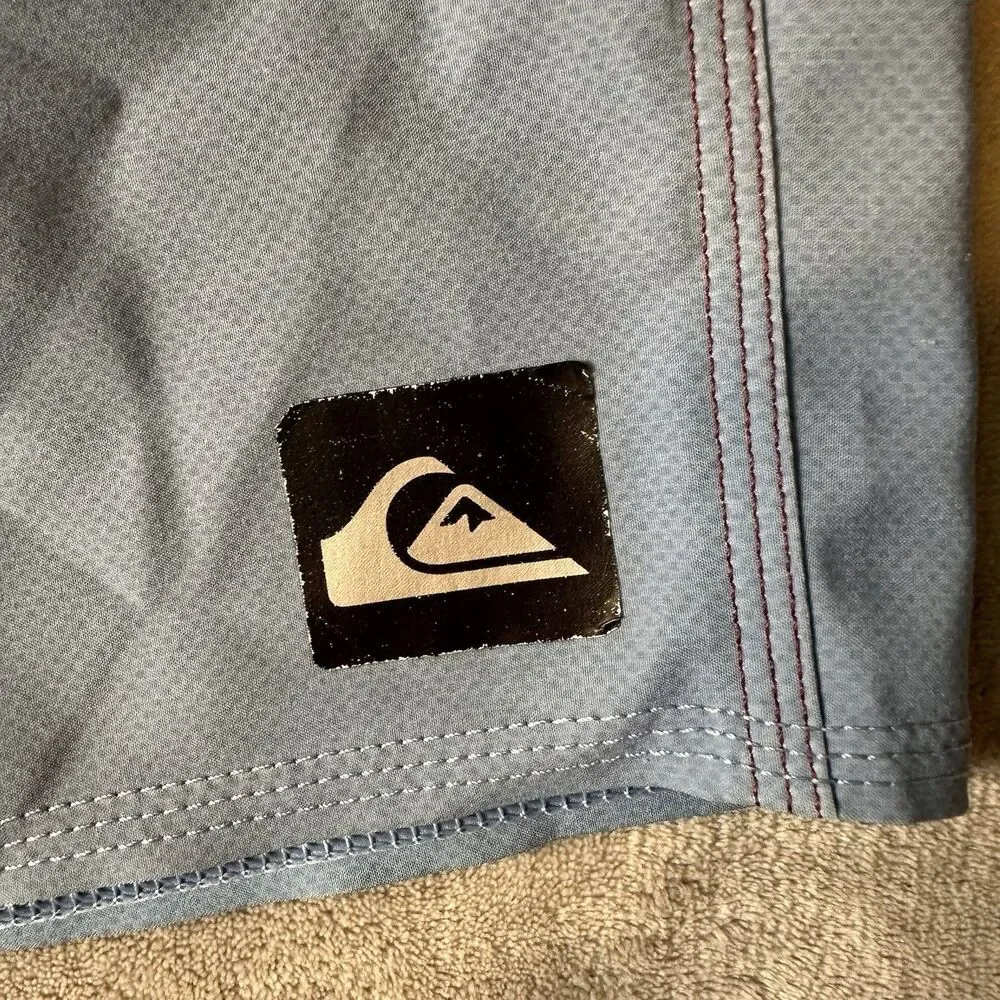 Quiksilver Men's Board Shorts Size 32 waist Striped Burgundy Blue Yellow Black